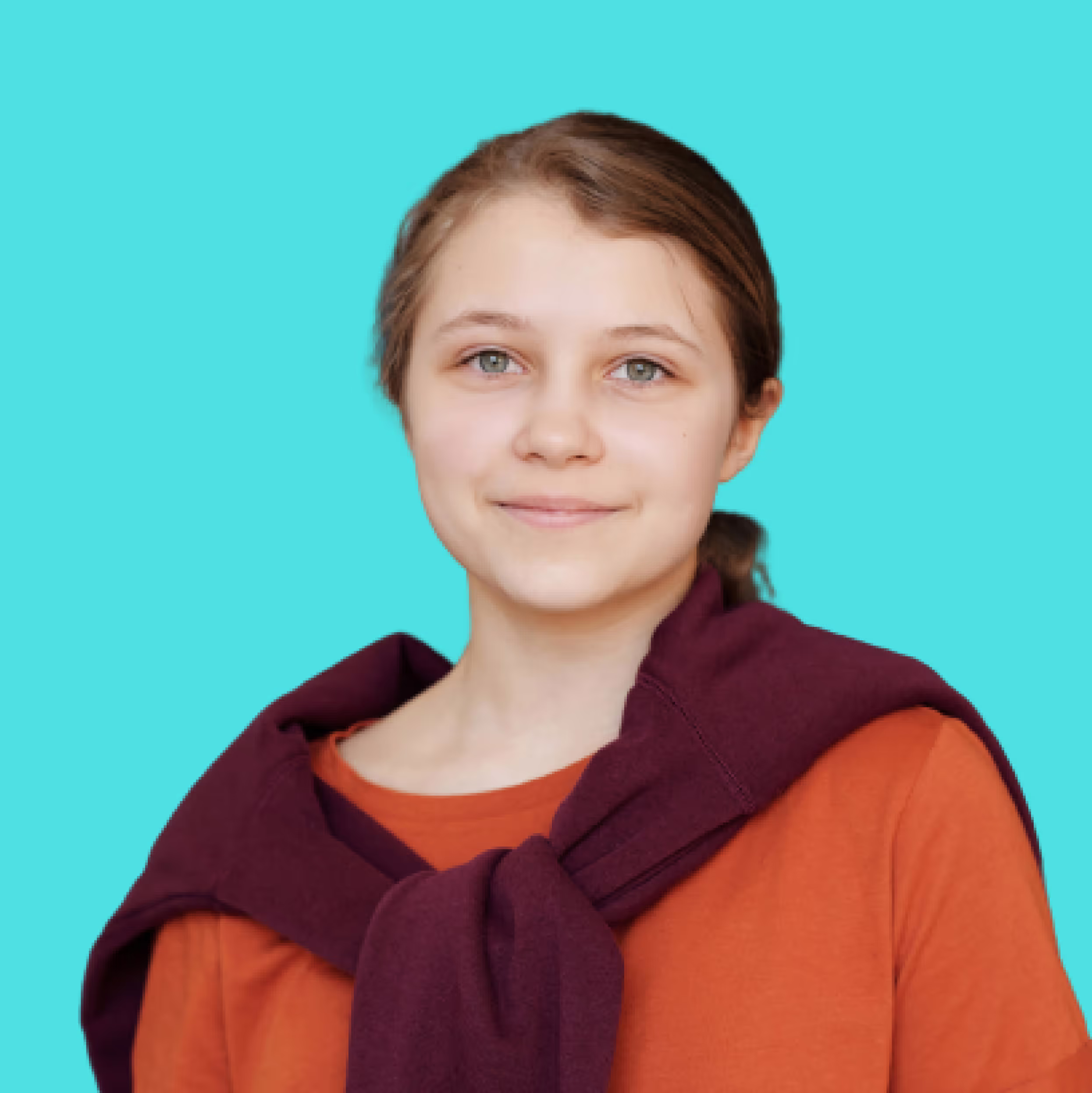 Student smiling and giving a testimonial